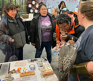 A falconer helps educate visitors on lead and copper ammunition More is available on this in this video httpsvimeocom773942881